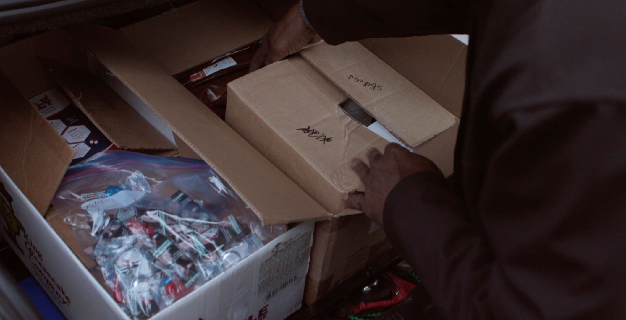 The “Change at Your Own Pace” campaign with Michigan’s Department of Health and Human Services prominently featured harm reduction activities, including people distributing supplies like naloxone and syringes.