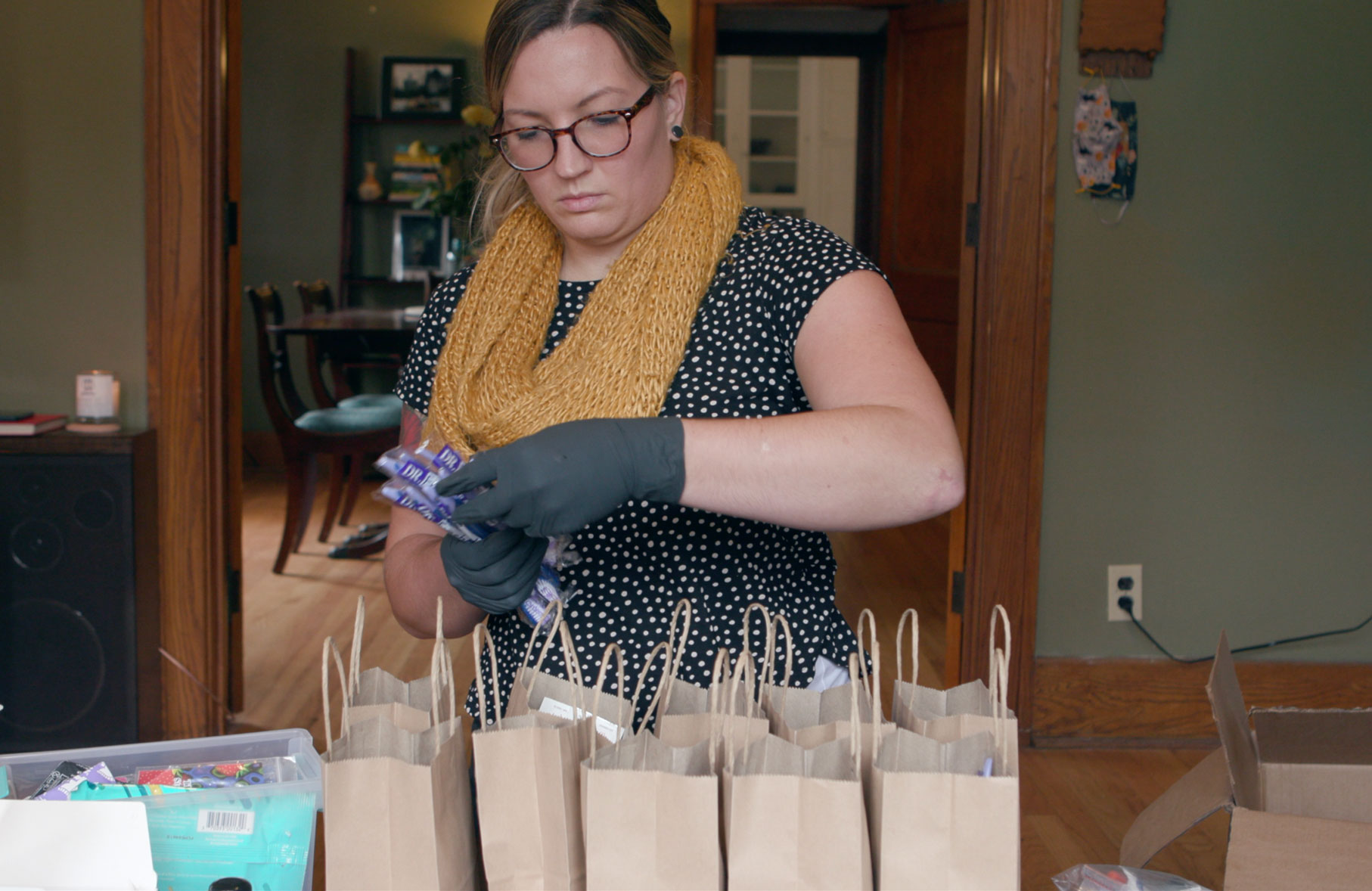 Lauren, a harm reductionist, assembles harm reduction supplies. Lauren was featured in Michigan’s Department of Health and Human Services “Change at Your Own Pace” harm reduction ad campaign.
